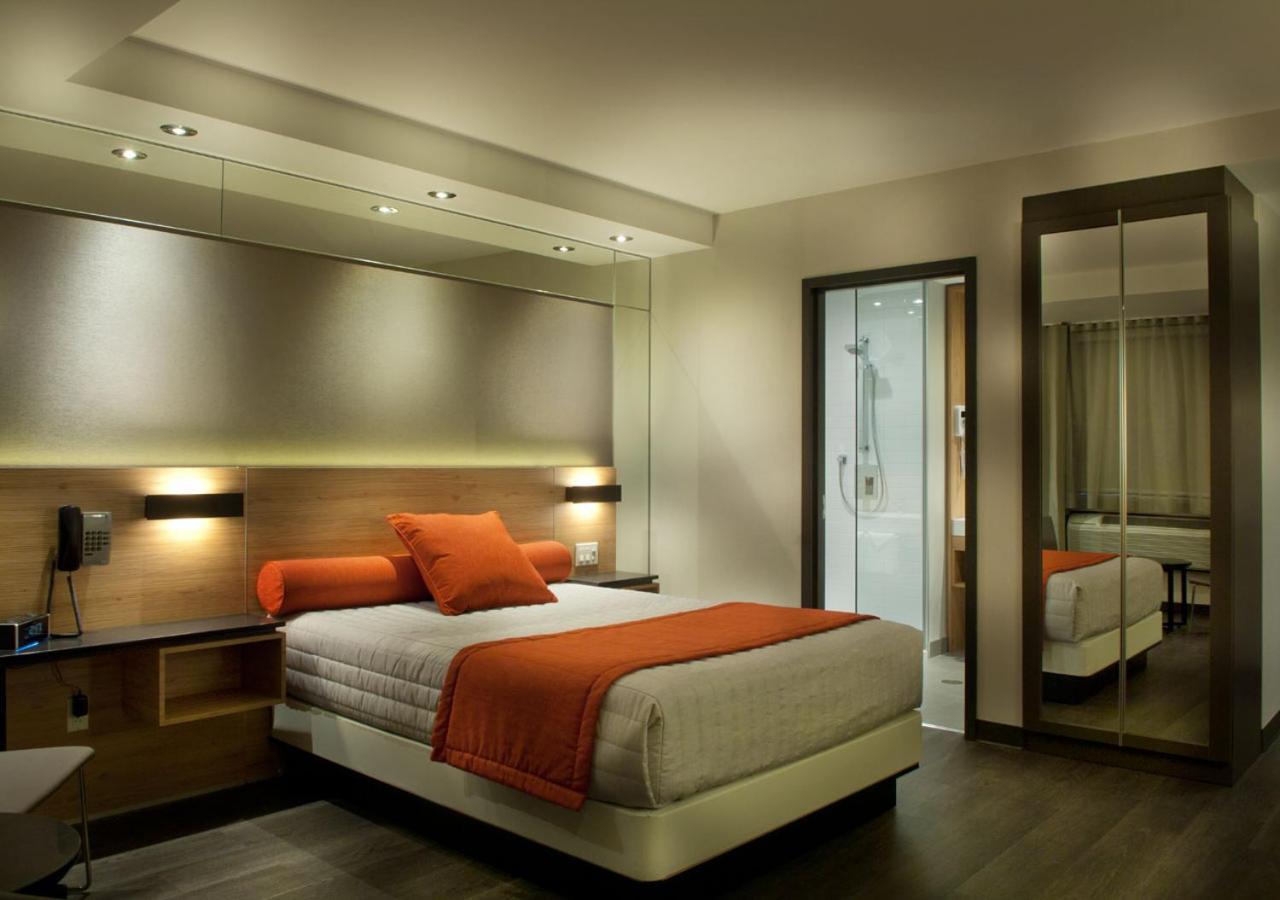 Hotel Ramada By Wyndham Laval Exterior foto